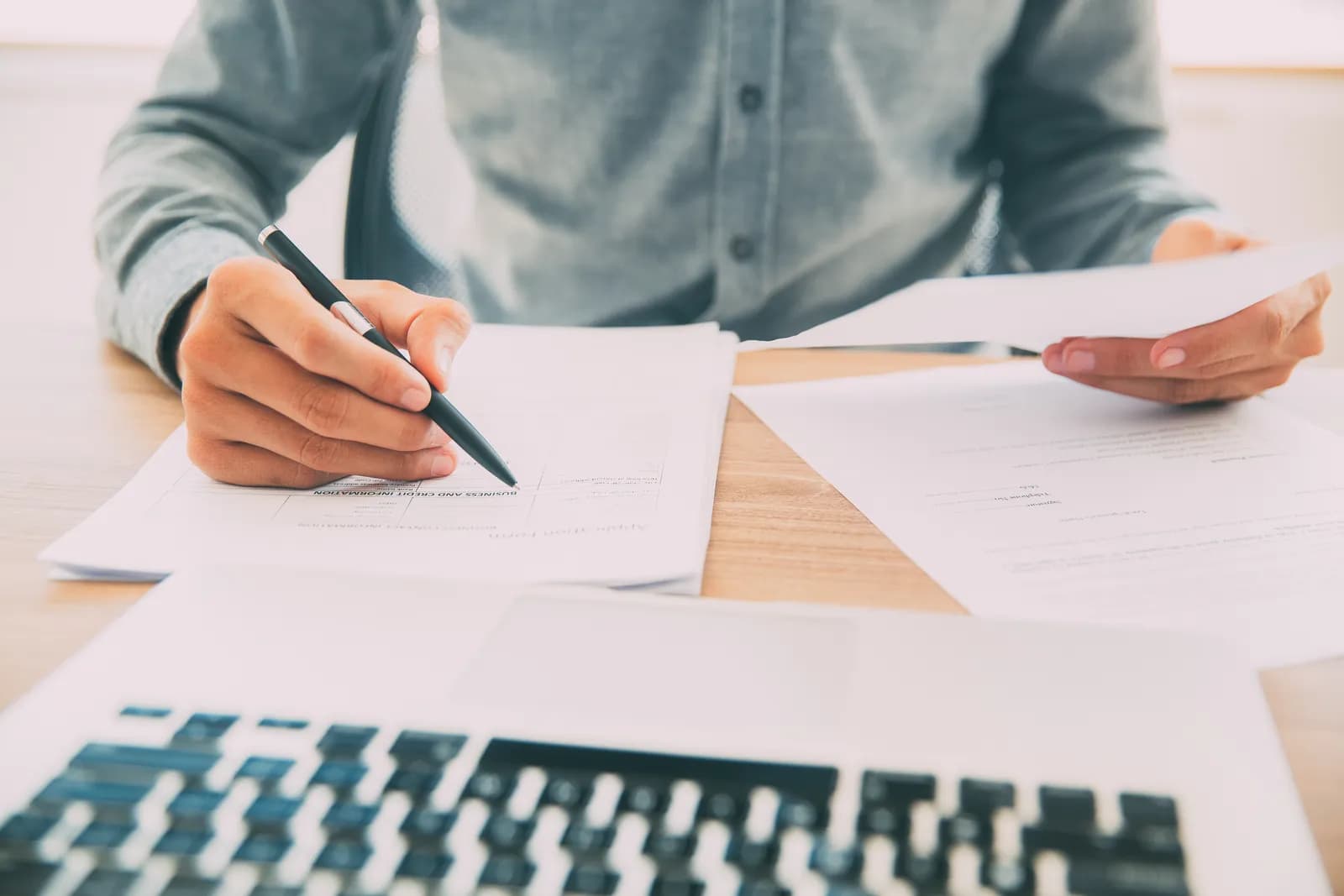 A solicitor reviewing legal documents